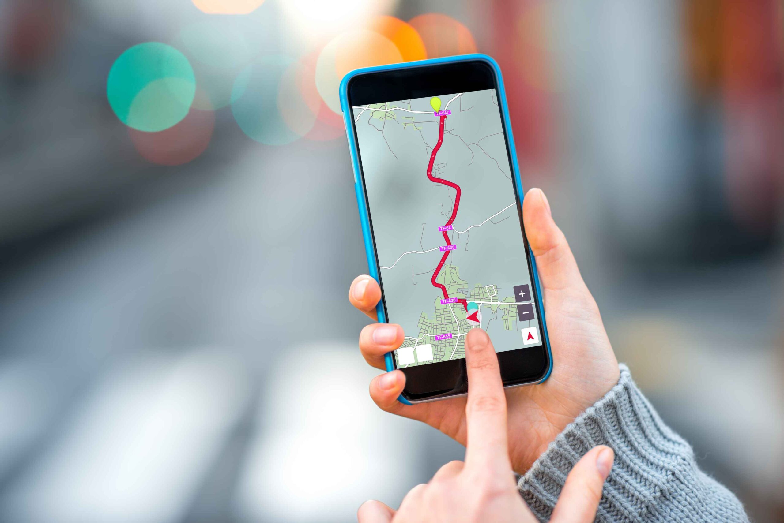 holding-smartphone-on-the-city-background-2025-03-14-01-08-06-utc_11zon