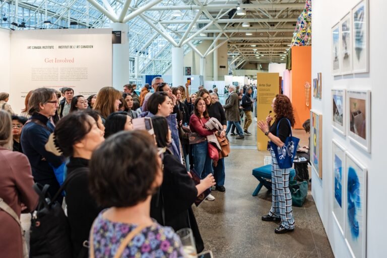 Crowds of visitors on the fair floor at Art Toronto