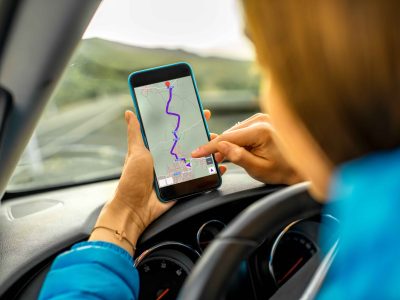 female-driver-using-smartphone-in-the-car-2025-03-15-23-52-12-utc_11zon